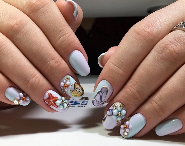 Nouveautés de manucure avec dessins: de magnifiques photos de l'idée du nail art avec une photo